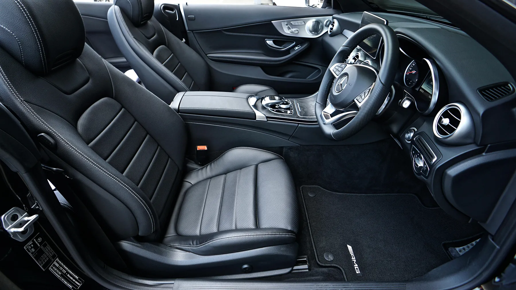 Detailed black AMG leather interior after a Pariona deep cabin cleaning