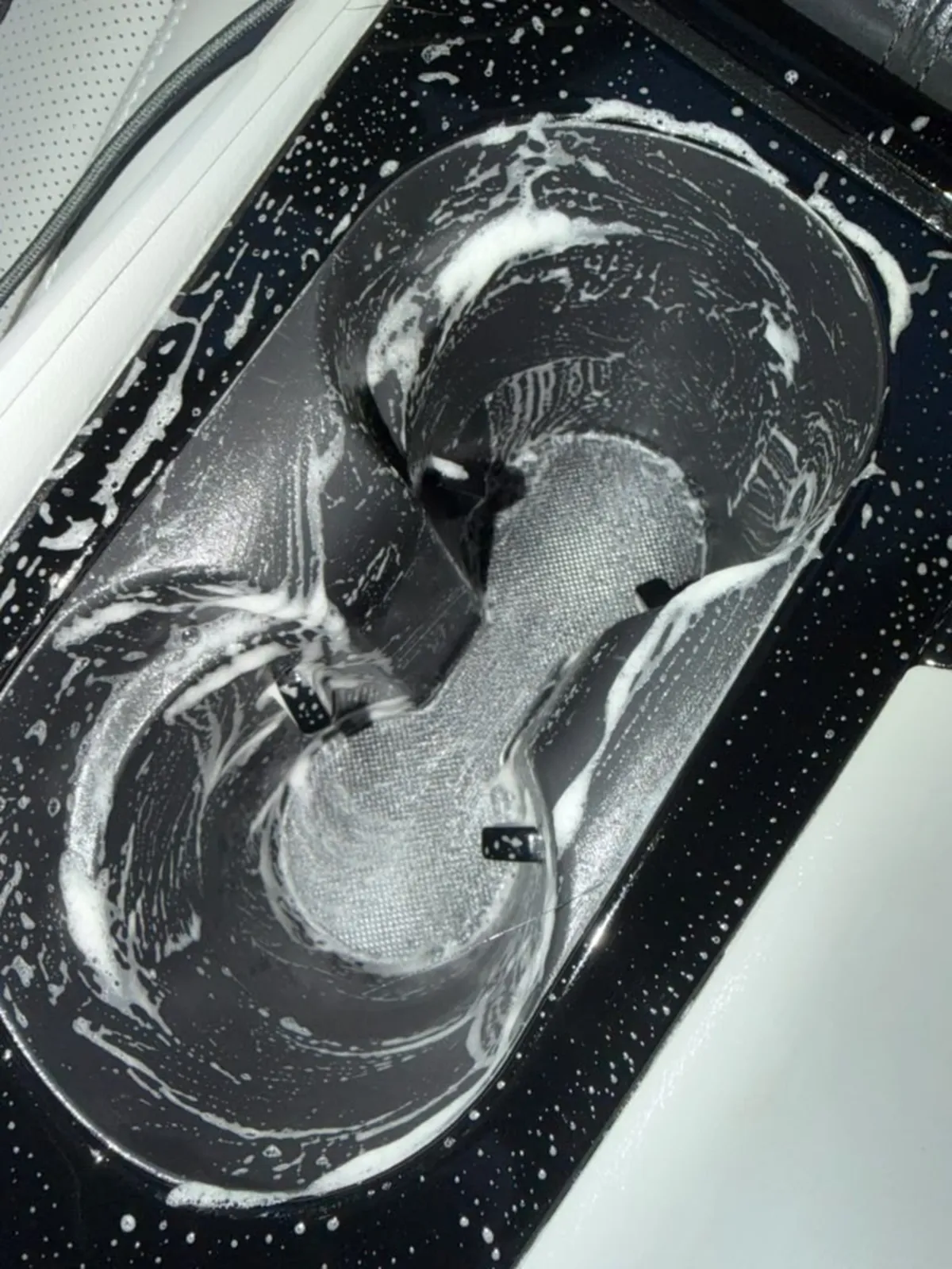 Foamed cup-holder during an interior deep-clean
