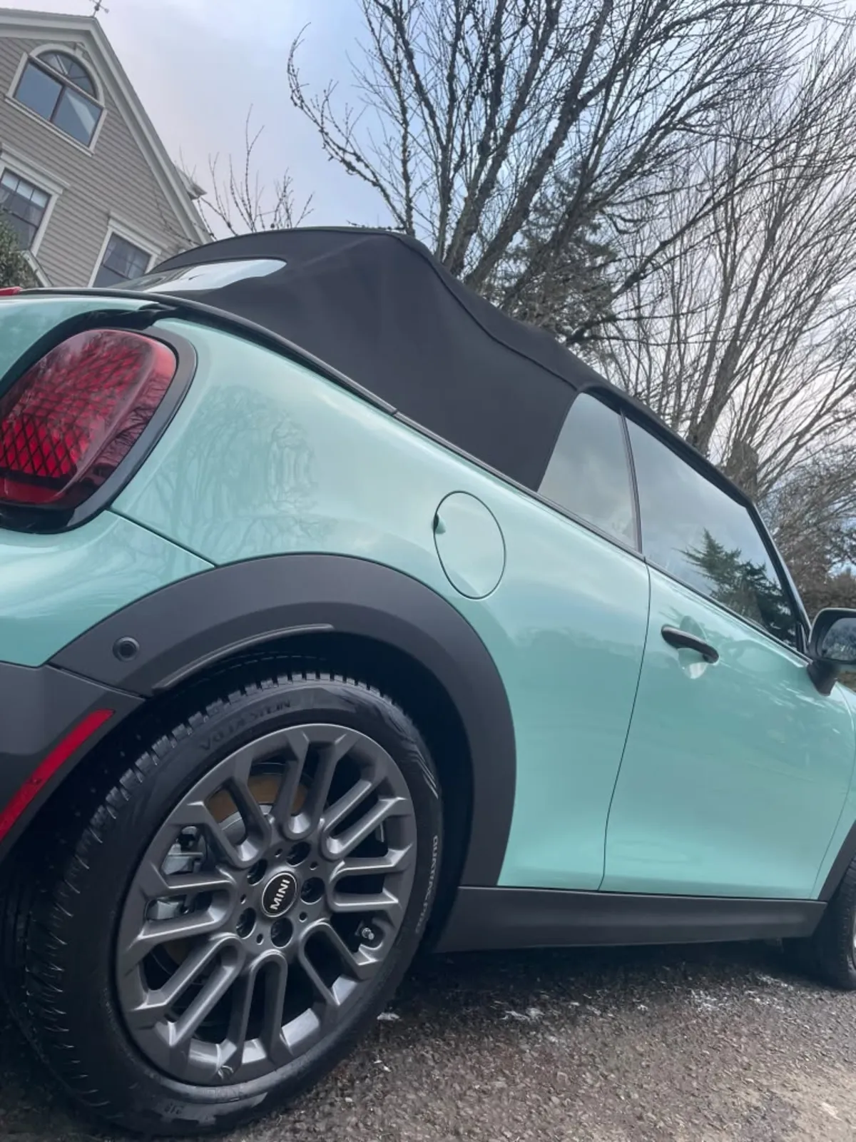 Close-up of a clean black wheel and fresh tire shine